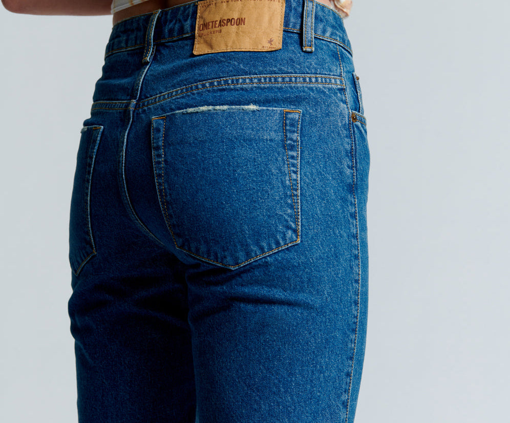 RIVIERA TRUCKERS MID RISE STRAIGHT LEG JEANS